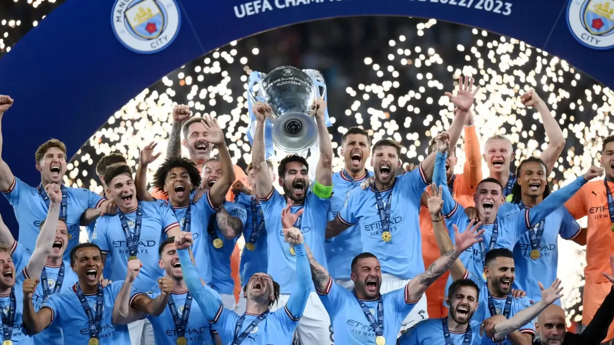 Manchester City win treble